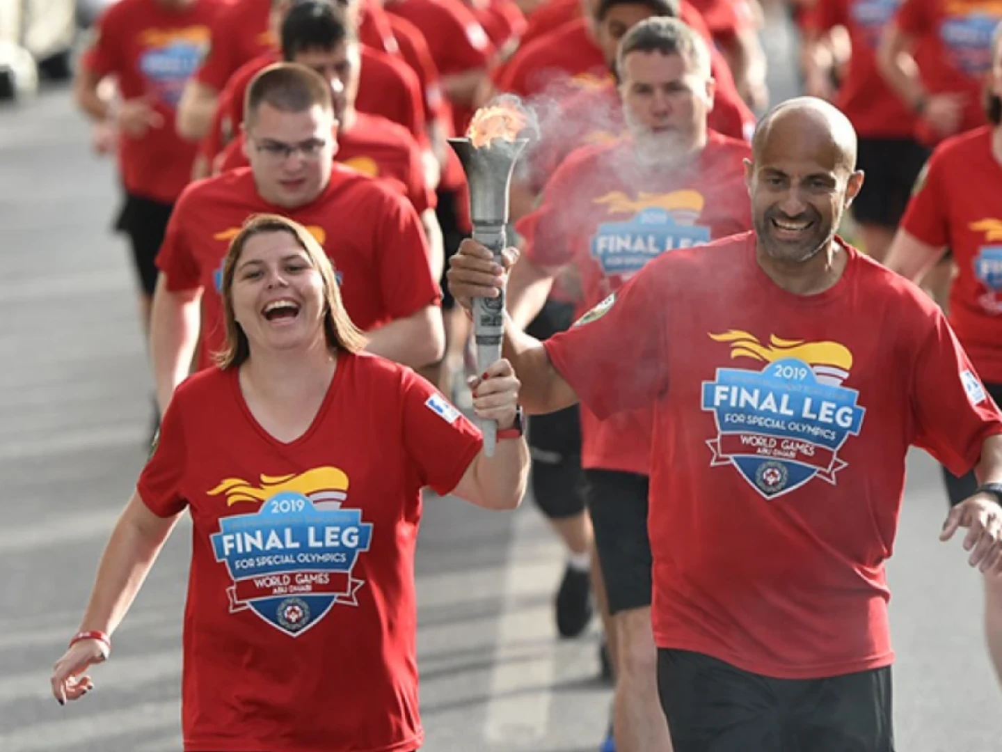 Special Olympics World Games participants during torch relay