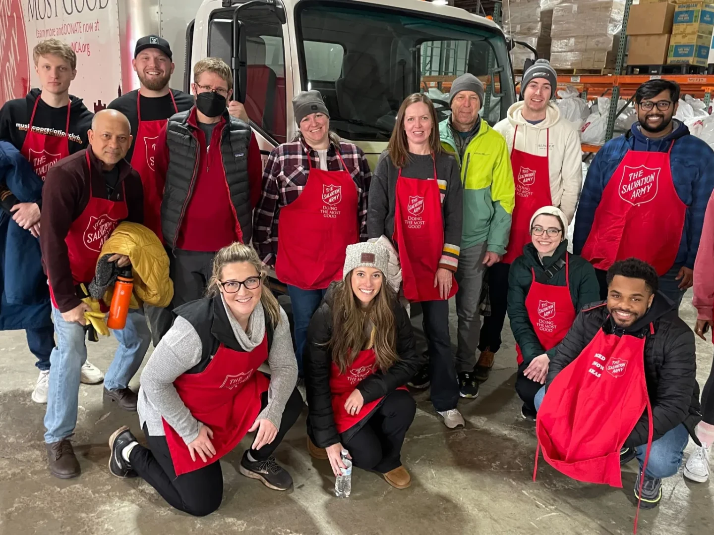 Volunteers in front of the Salvation Army truck at the Angel Tree warehouse