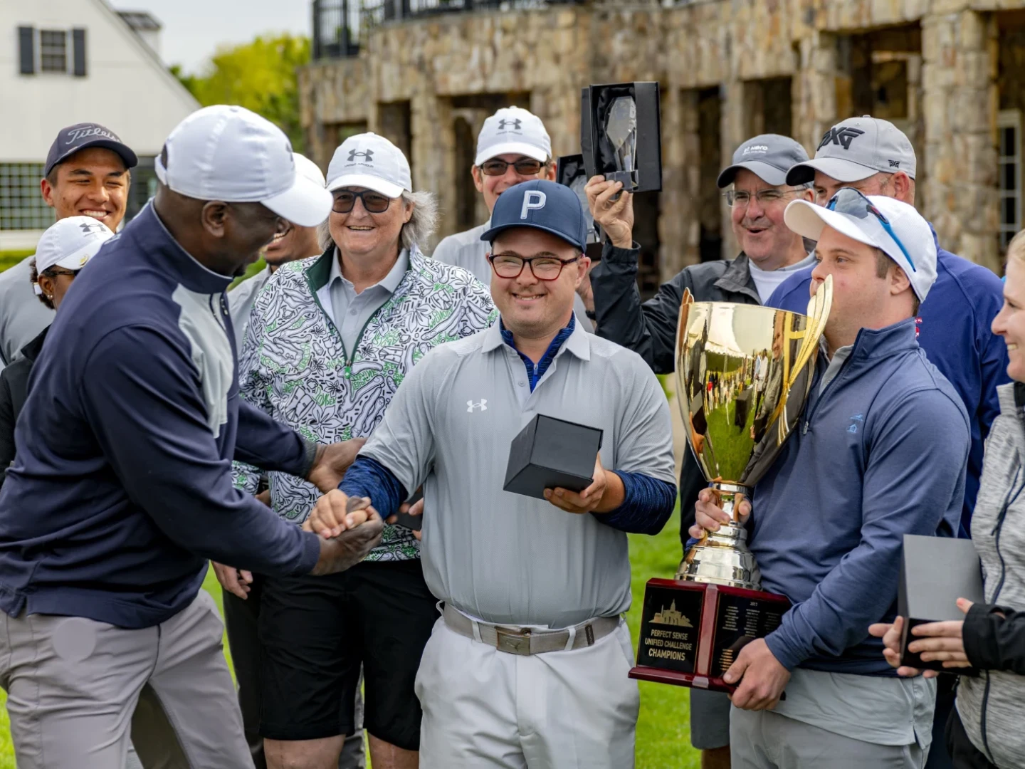 Pro-Am participants and winners during trophy presentation