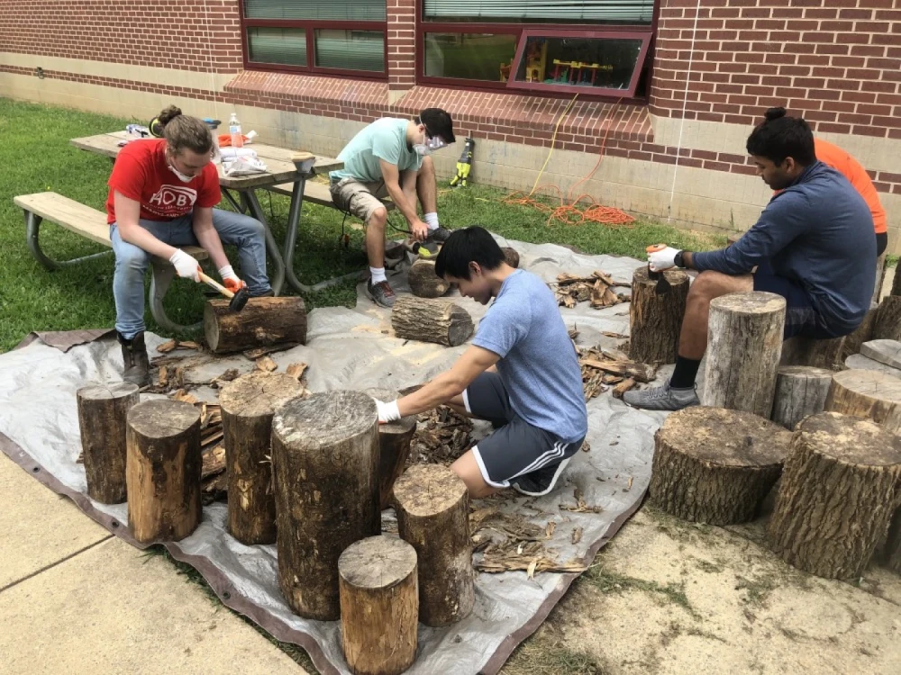 Brightspot volunteers at Aldrin Elementary School during spring garden beautification event