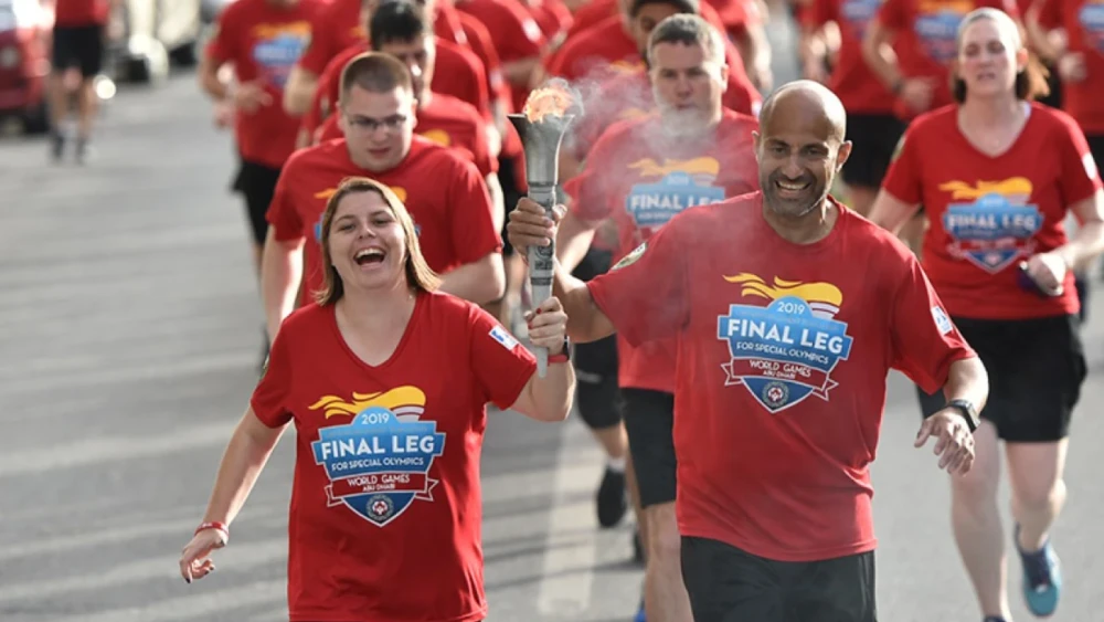Special Olympics World Games participants during torch relay